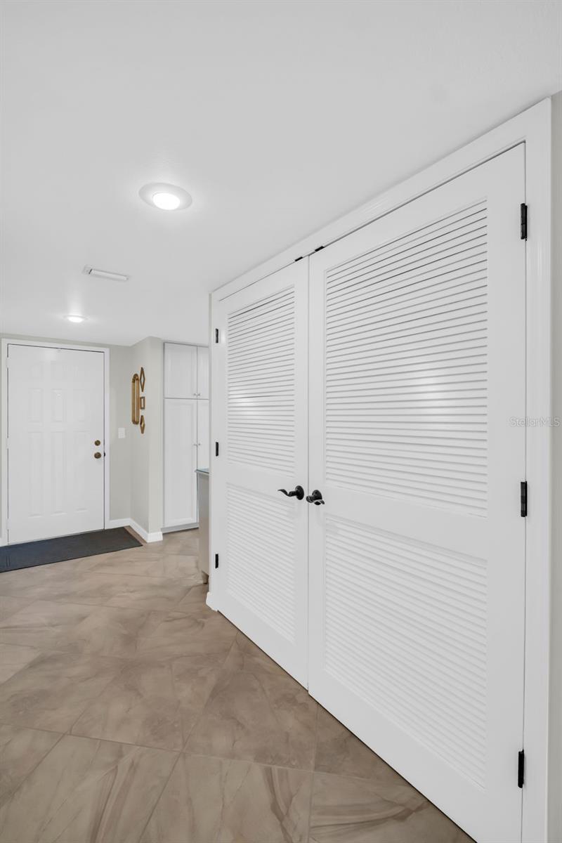 LAUNDRY CLOSET WITH STORAGE