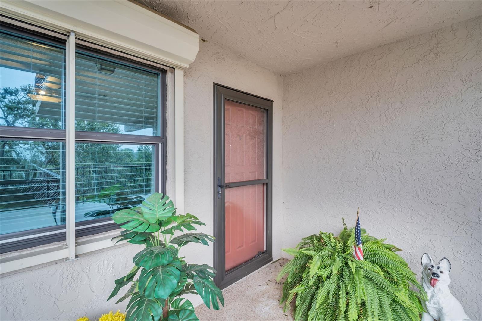 PRIVATE ENTRANCE TO IN-LAW/GUEST SUITE