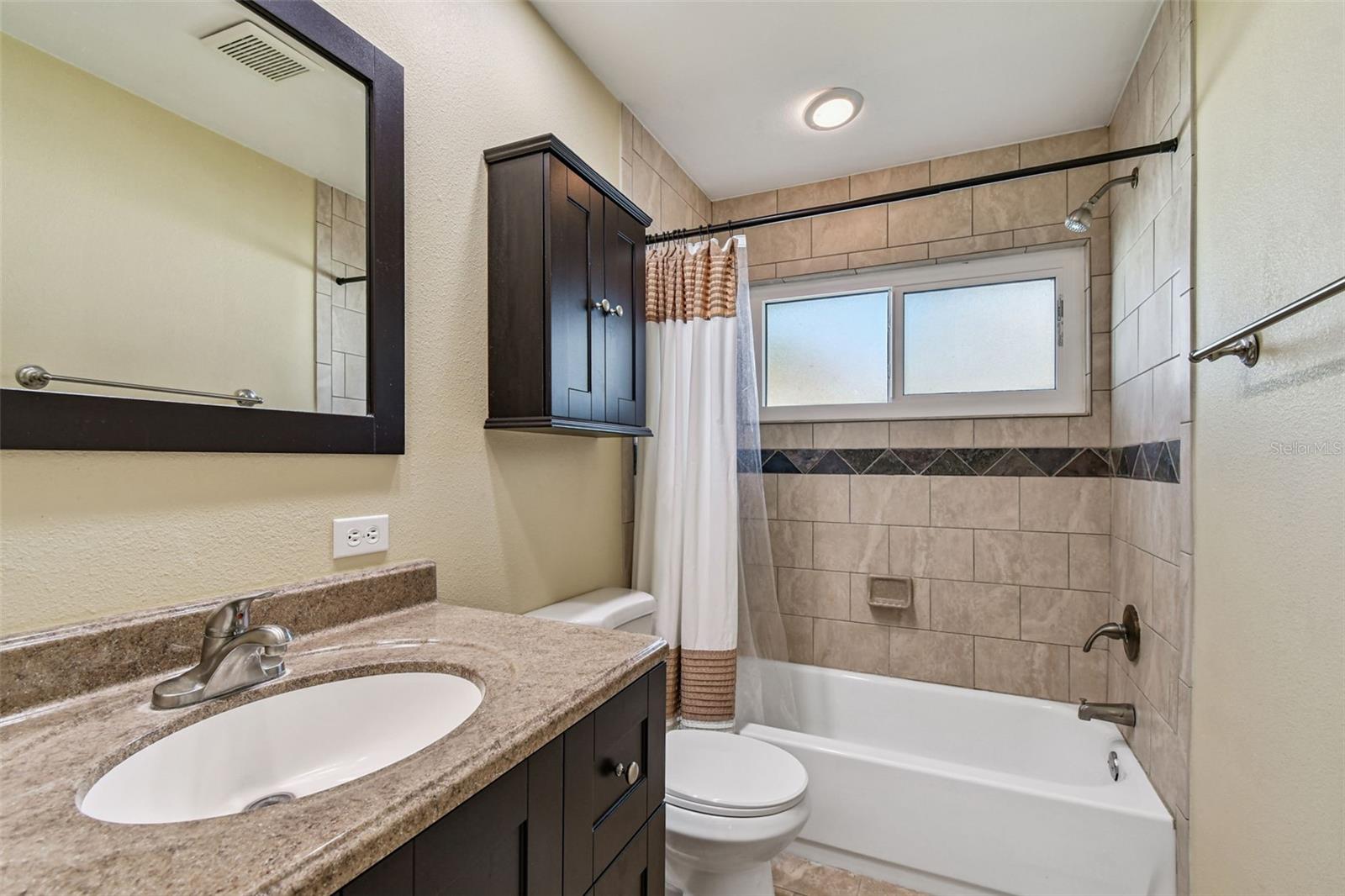 Remodeled bathroom with tub