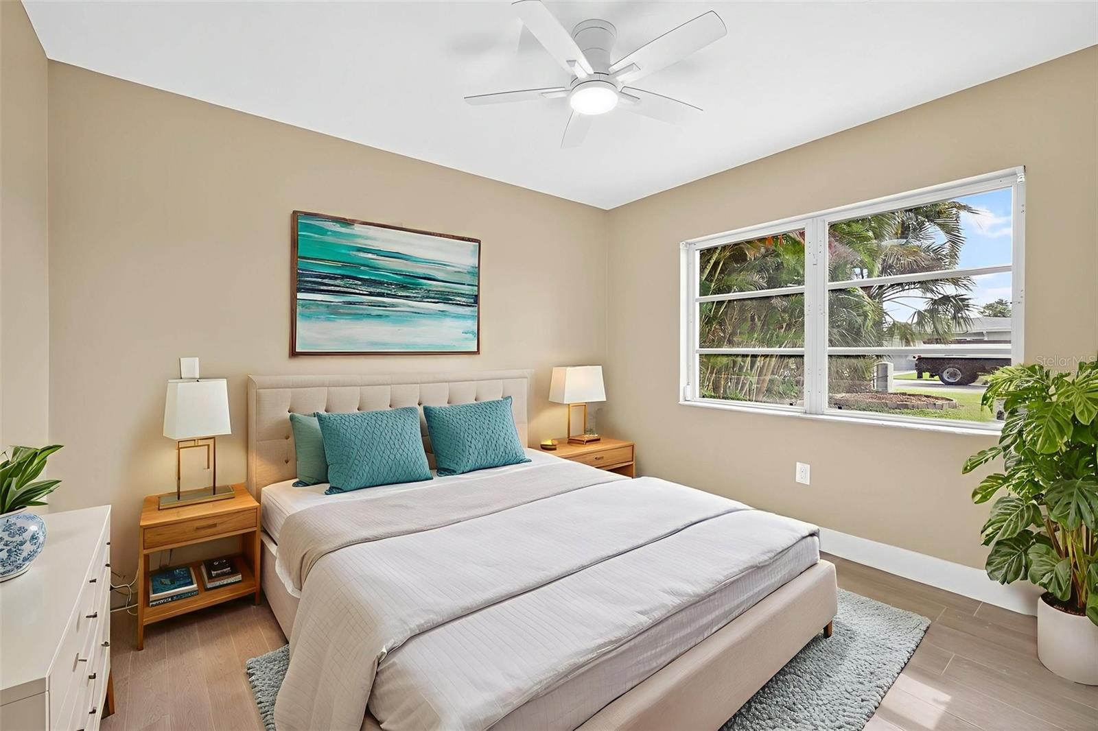 Virtually Staged Guest Guest Bedroom 1 located at the Front of the Home
