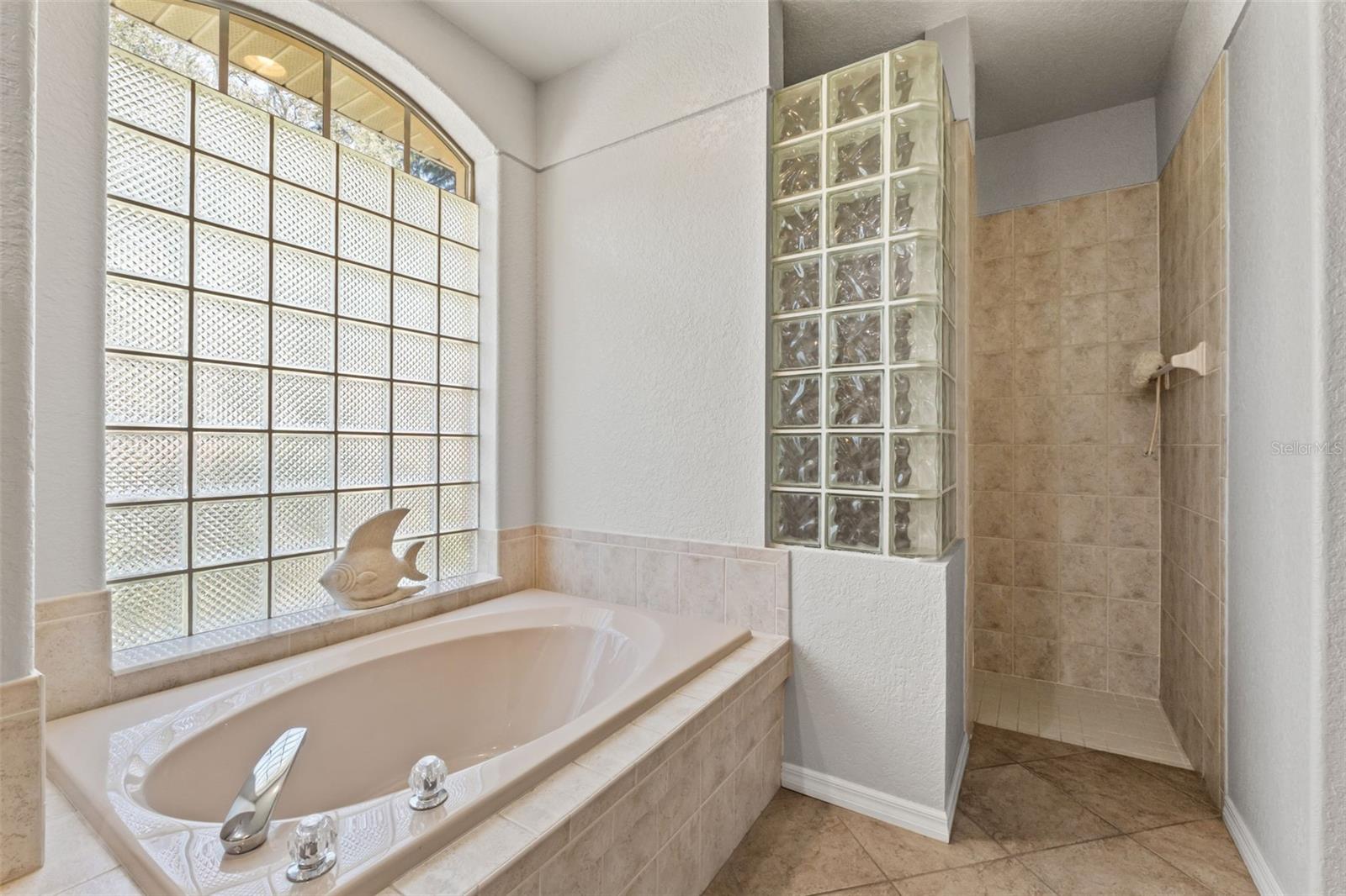 WALK-IN SHOWER IN PRIMARY BATHROOM