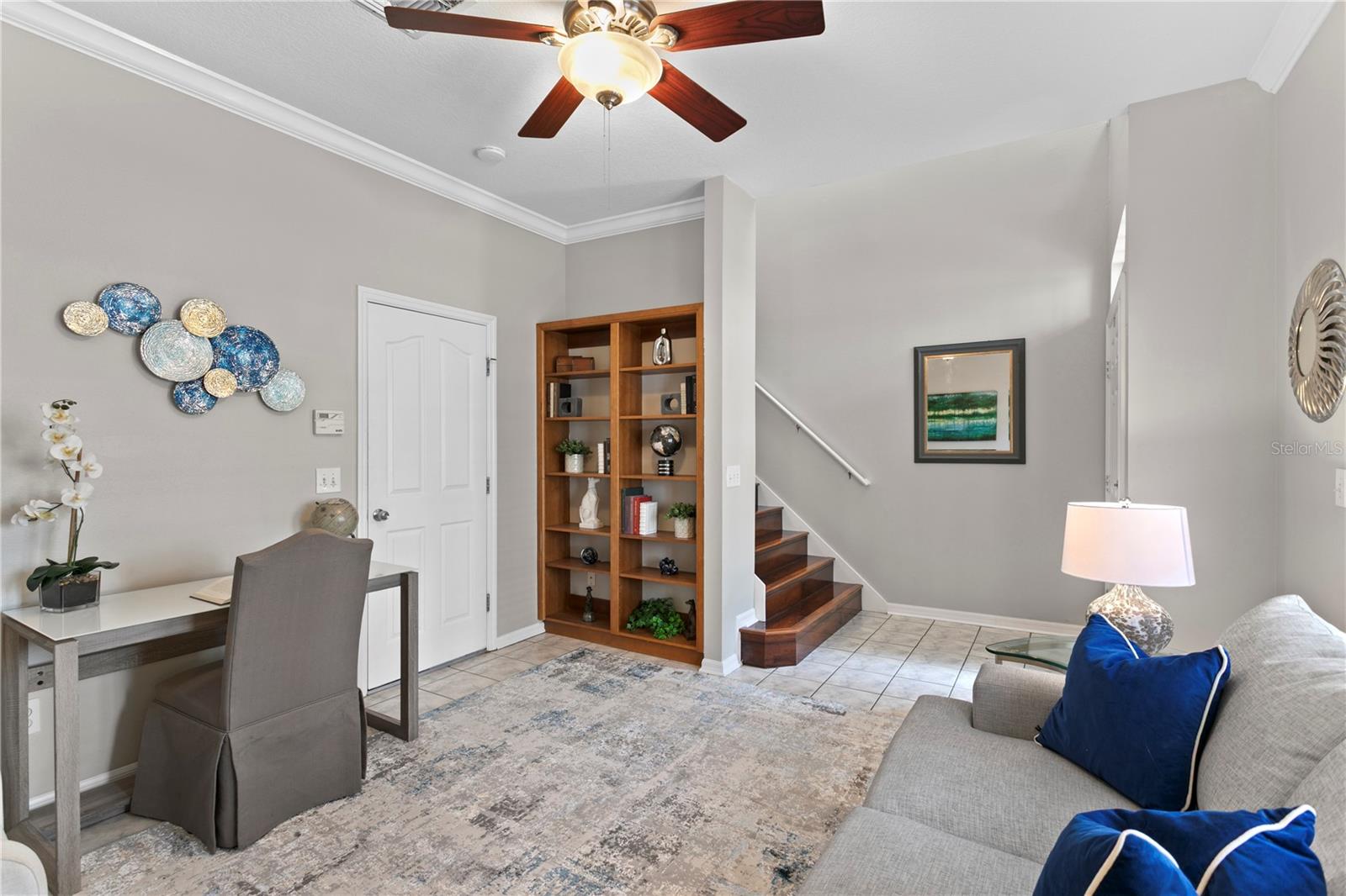 This first-floor bonus room is ideal for today’s flexible lifestyle—perfect as a dedicated home office, media room, or creative studio. Thoughtful built-in shelving provides stylish storage and display options