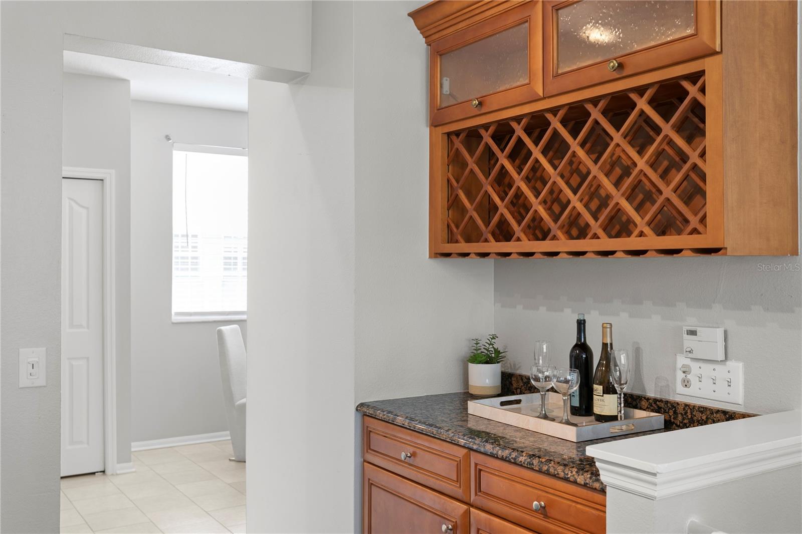 This charming dry bar offers the perfect spot to unwind with an after-work drink or transform it into a cozy coffee station for your afternoon pick-me-up.