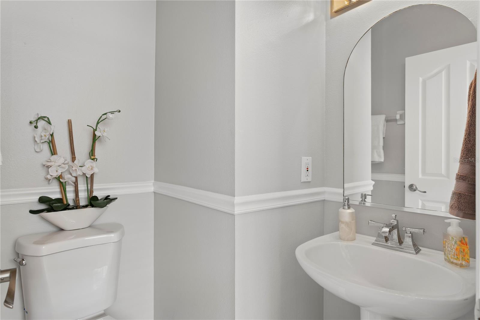 There is a half bathroom conveniently located for guests