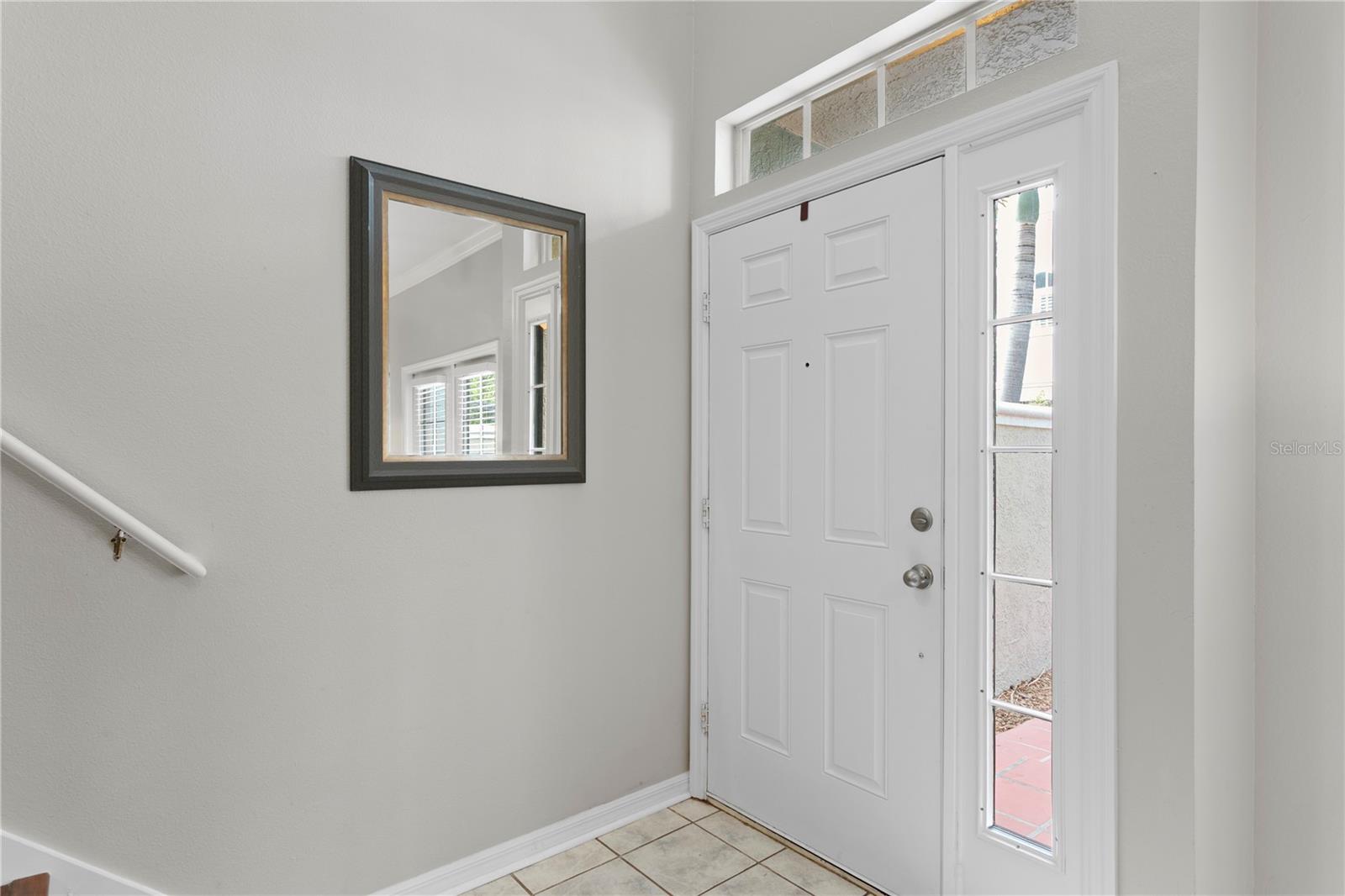 Step inside the inviting front door and feel instantly at home
