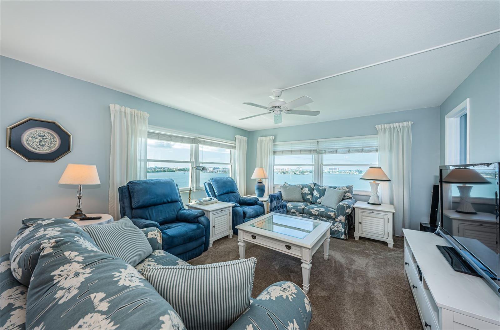 Living room with updated windows and Hurricane Shutters