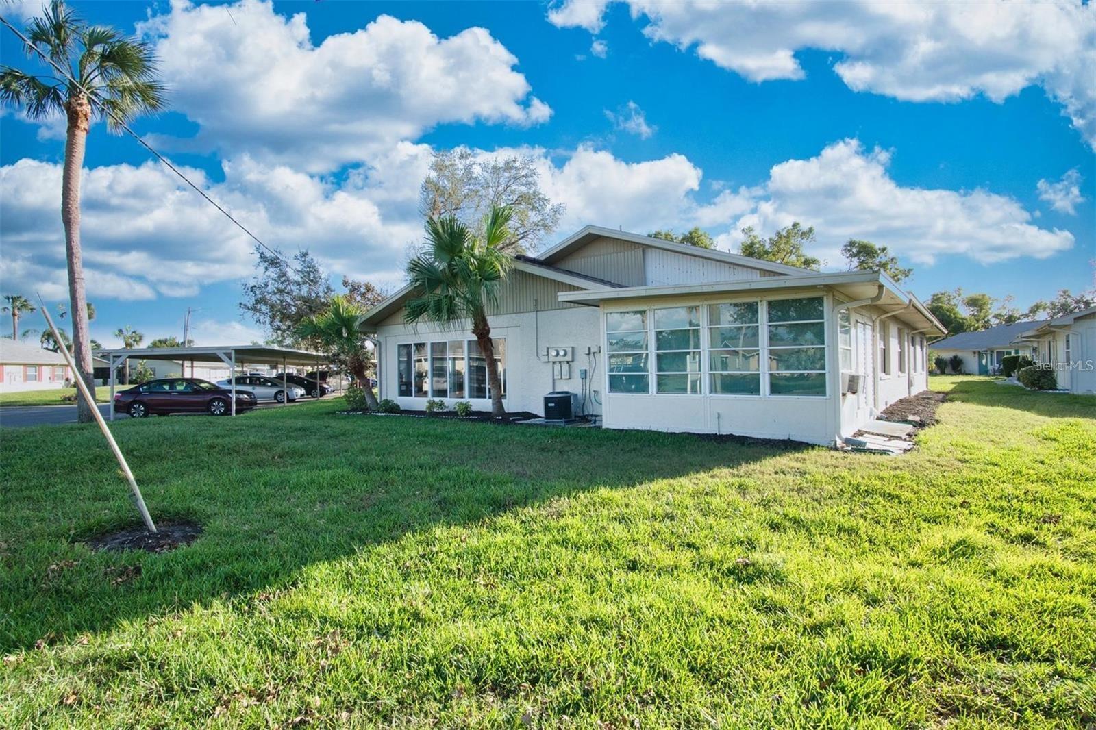 Rear exterior with bonus storage room