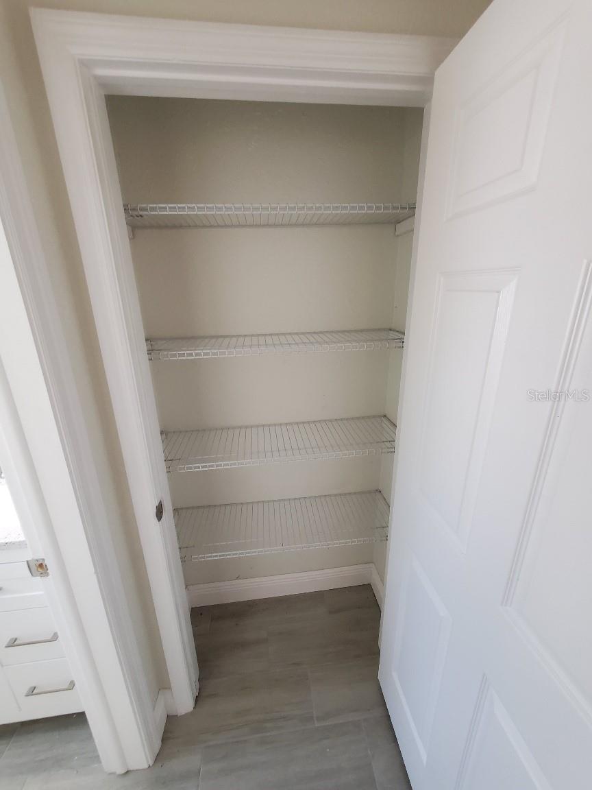 LINEN CLOSET JUST OUTSIDE OF BATHROOM