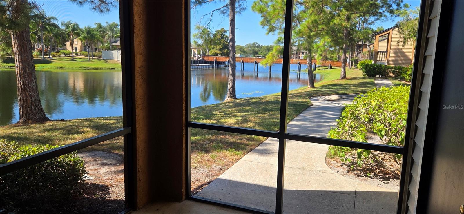 Screened in lanai with beautiful view of the lake