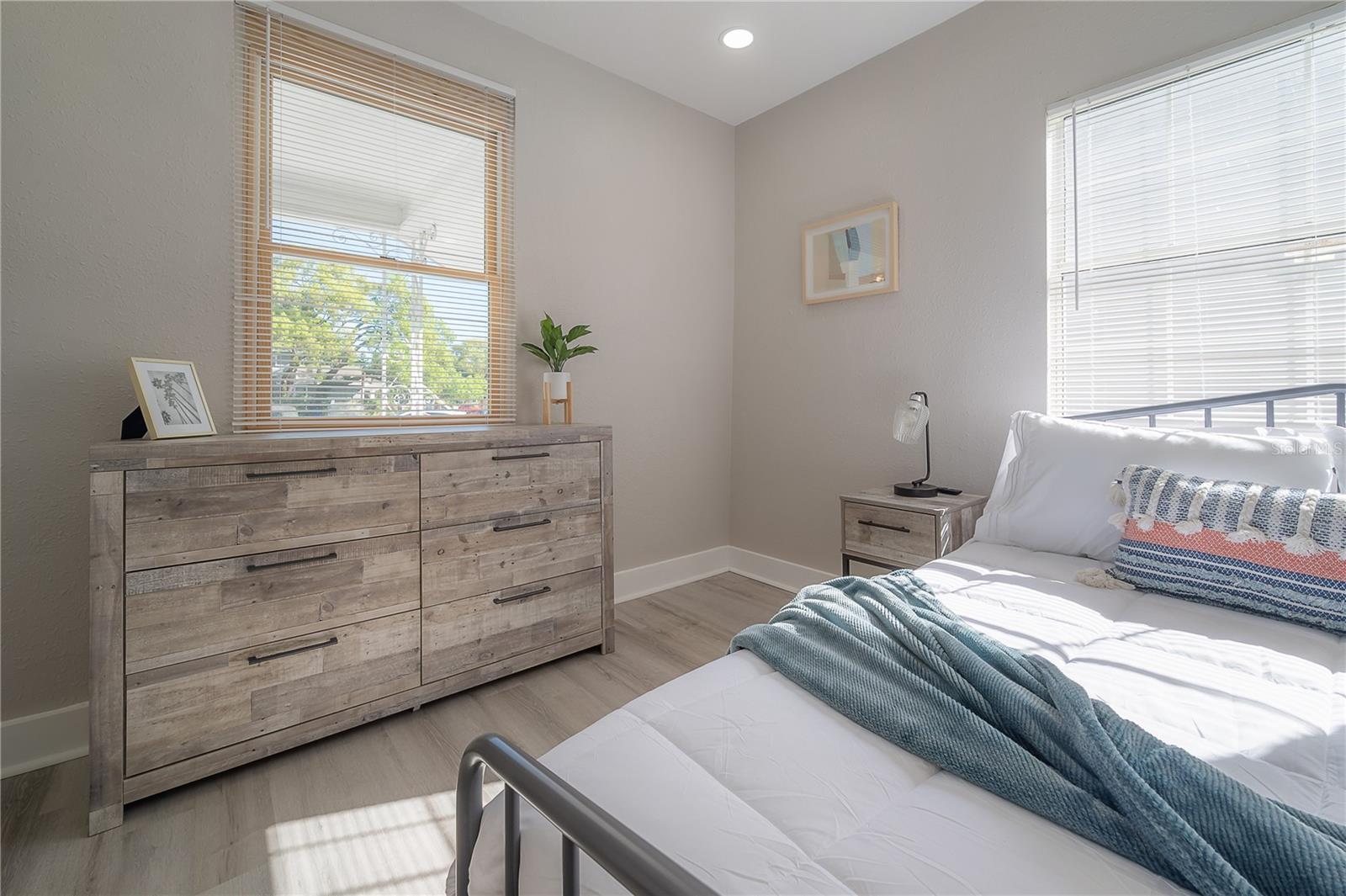 photos of downstairs  bedroom from when the home was previously an airbnb