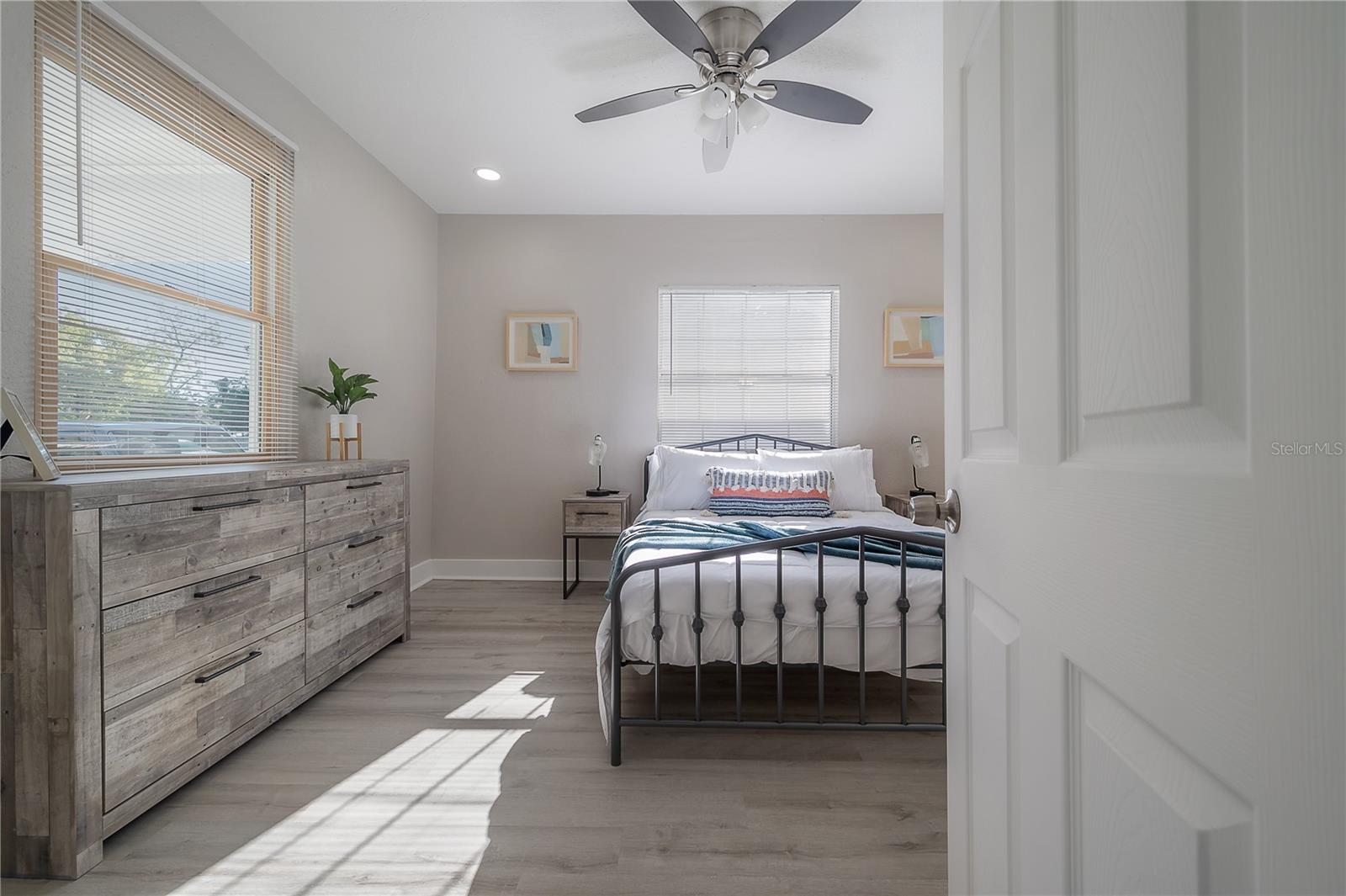 photos of downstairs  bedroom from when the home was previously an airbnb