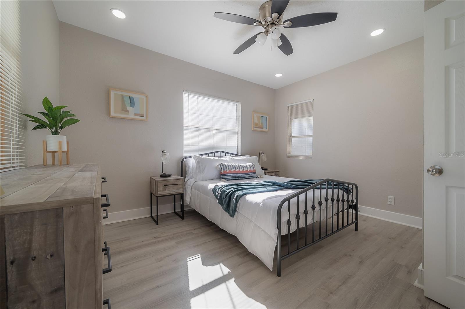 photos of downstairs  bedroom from when the home was previously an airbnb