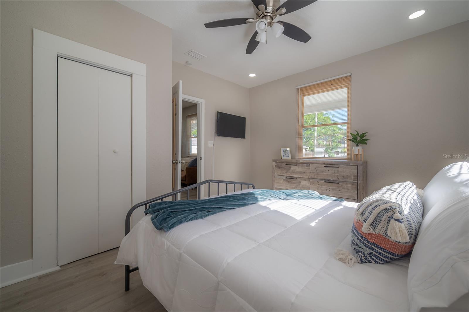 photos of downstairs  bedroom from when the home was previously an airbnb