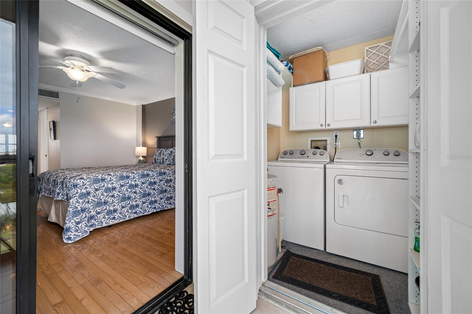 Laundry room with full size washer and dryer
