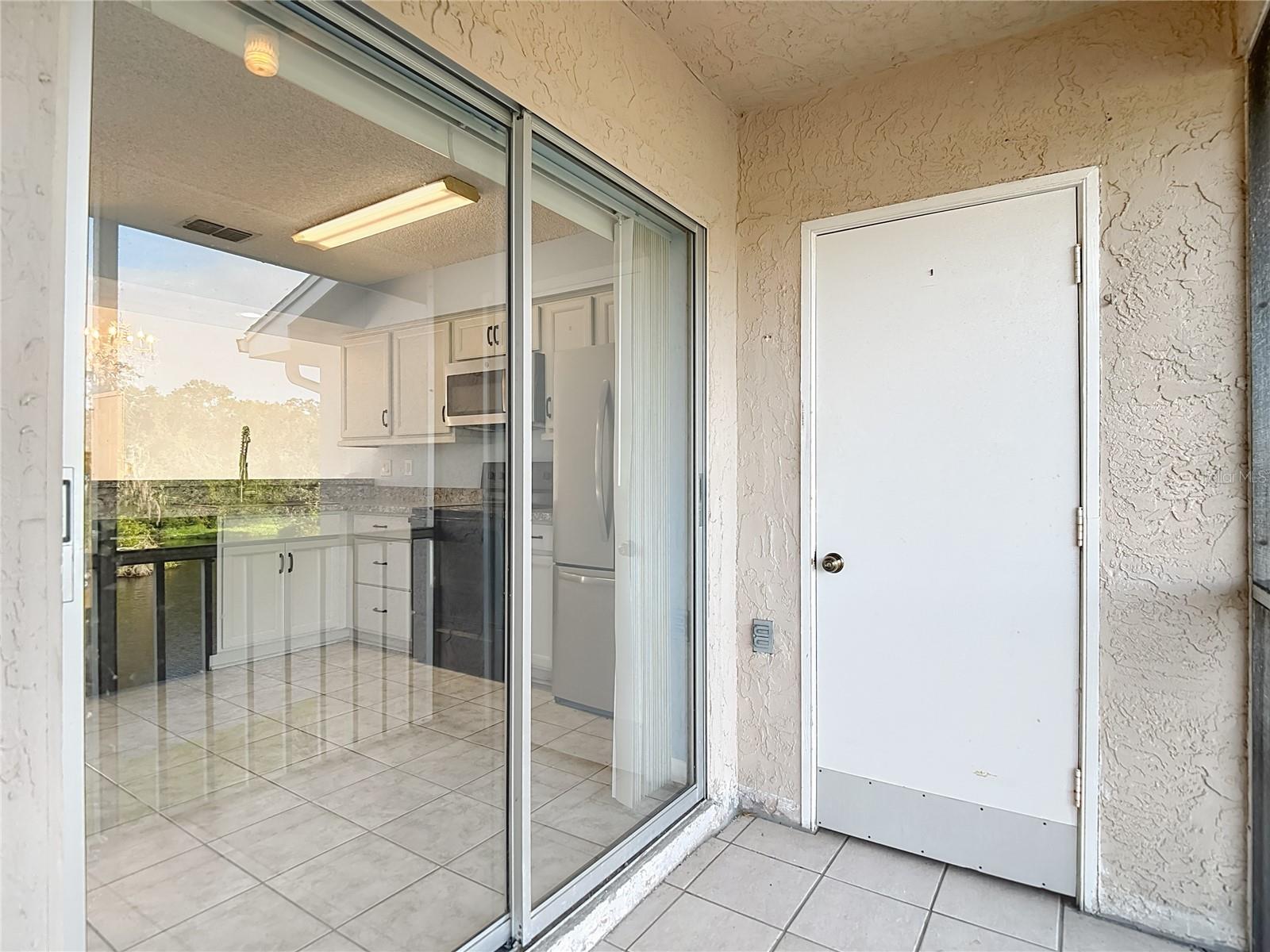 Sliding Doors to Kitchen - Patio Storage