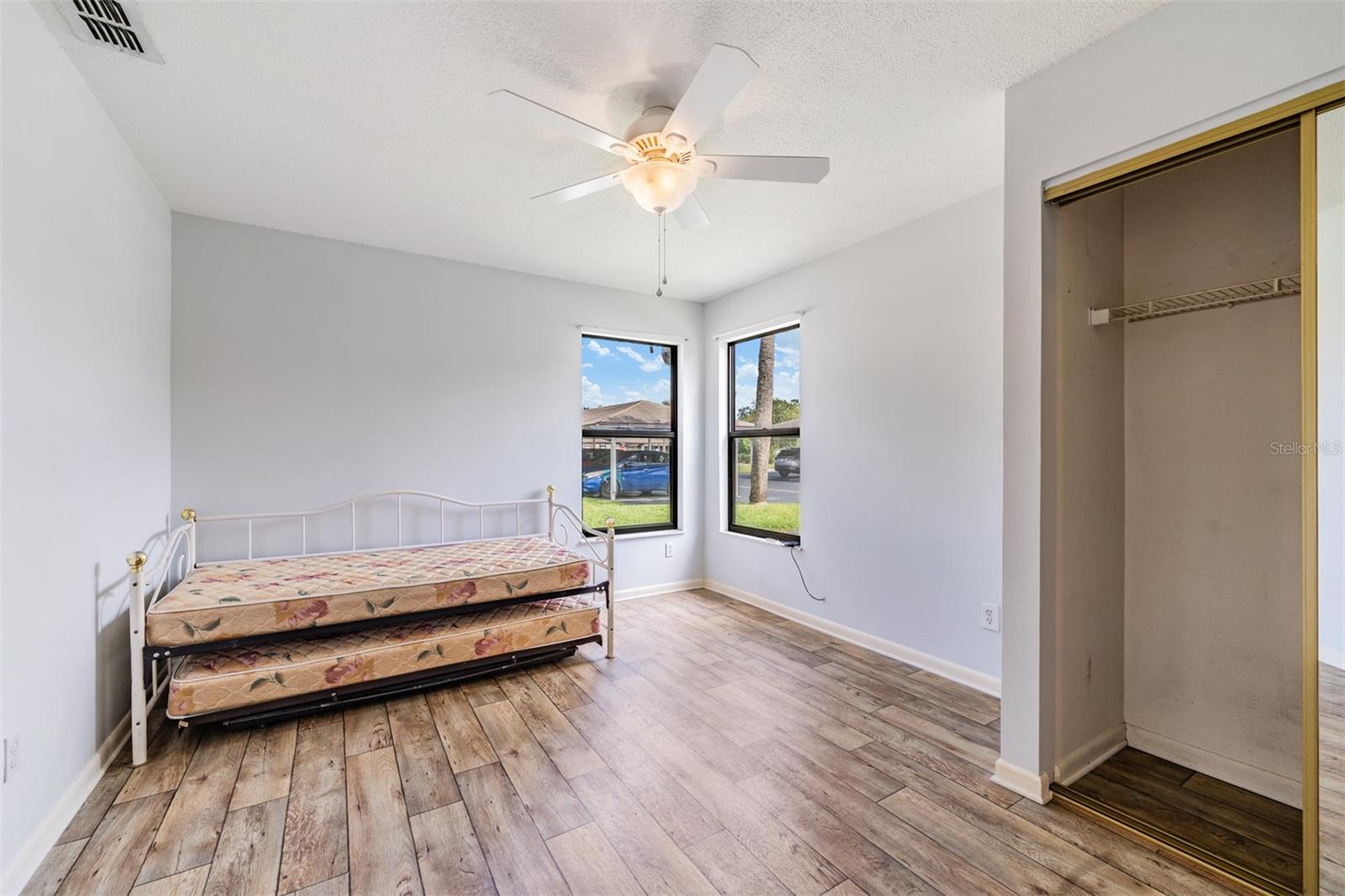 Master Bathroom, lots of sunlight, Ceiling Fan, Laminate Flooring.