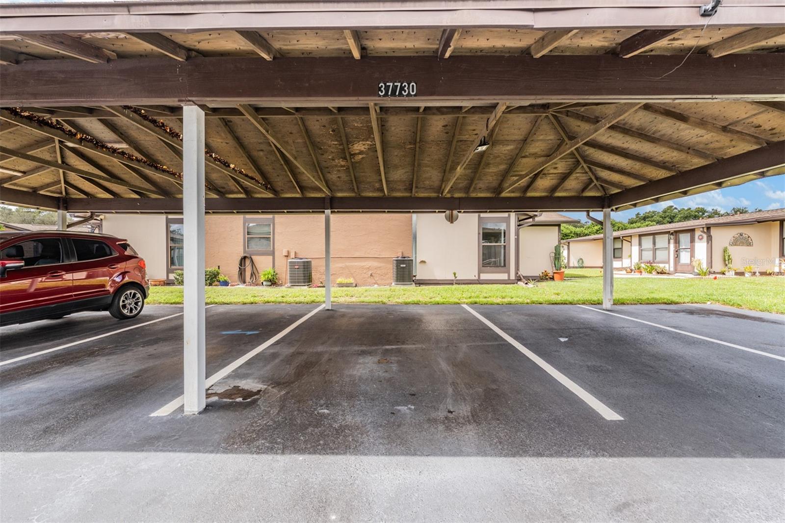Covered parking just in front of the condo
