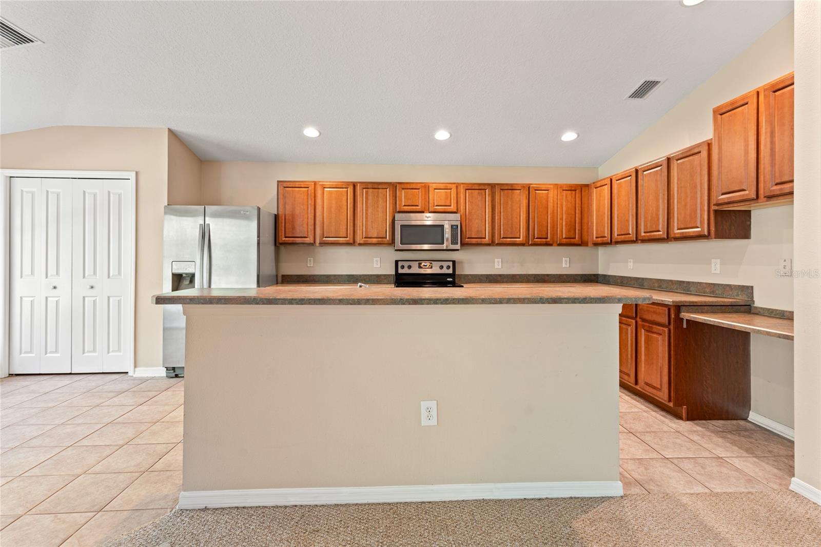 Breakfast Bar View of Kitchen From Family Room