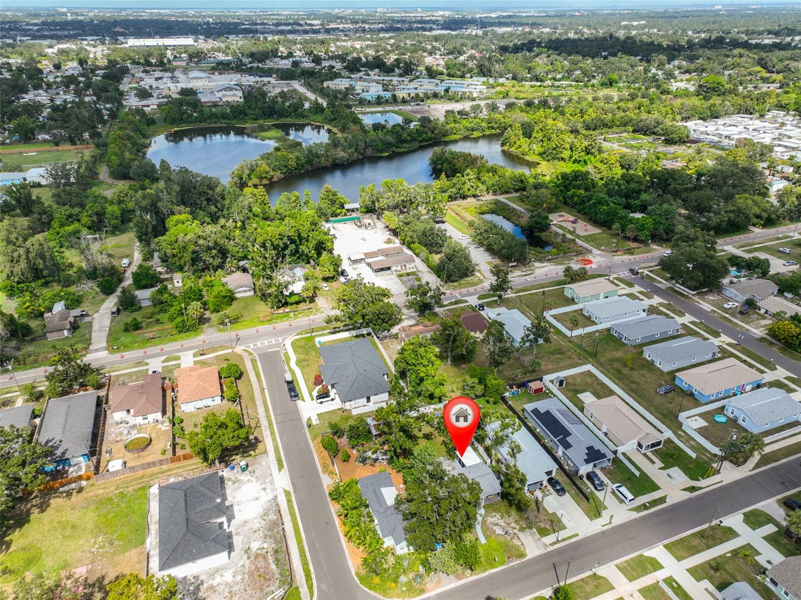 Raymond Neri Park with lake behind home