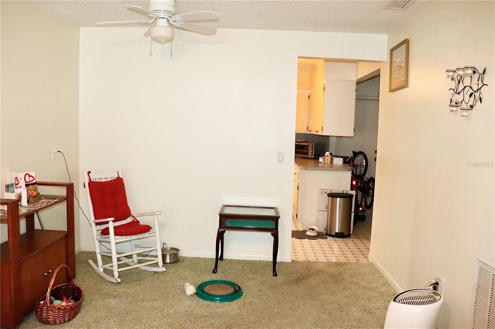 Dining space that leads to kitchen and bonus room