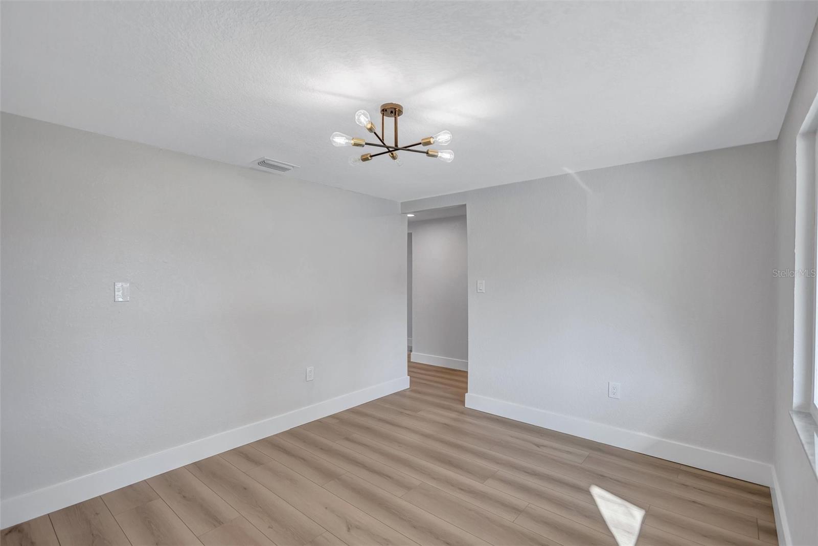 Dining Room to Left of entrance behind kitchen.