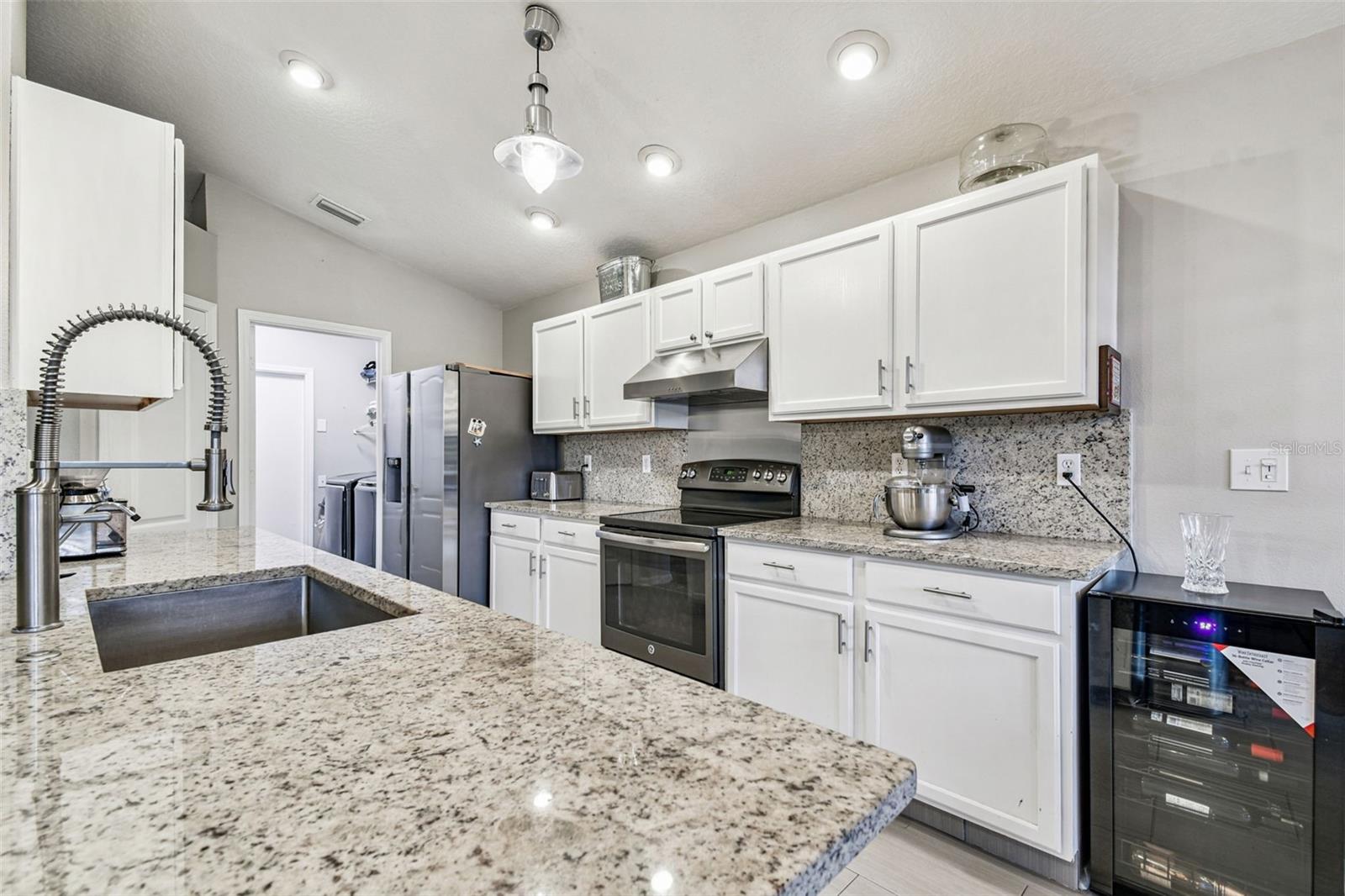 Commercial Grade Delta faucet & stainless steel large sink, New Samsung Fridge (2025) with manufacture's warranty