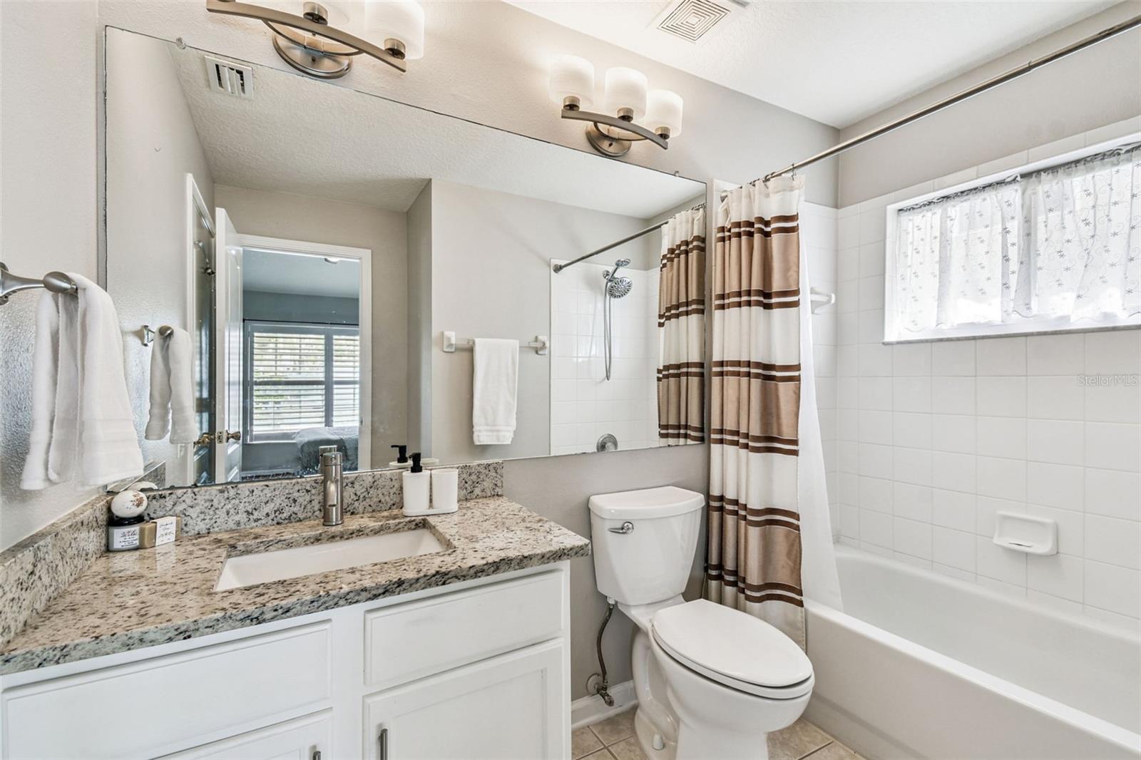 Secondary bath with granite countertops, upgraded faucet & Sink