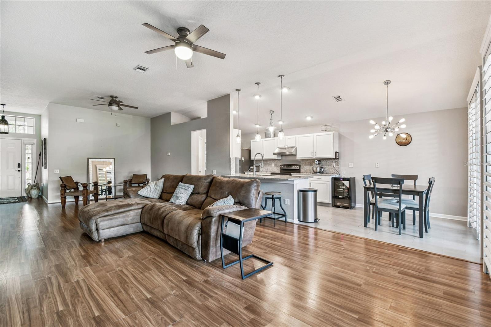 Open concept, designer finishes, high ceilings!