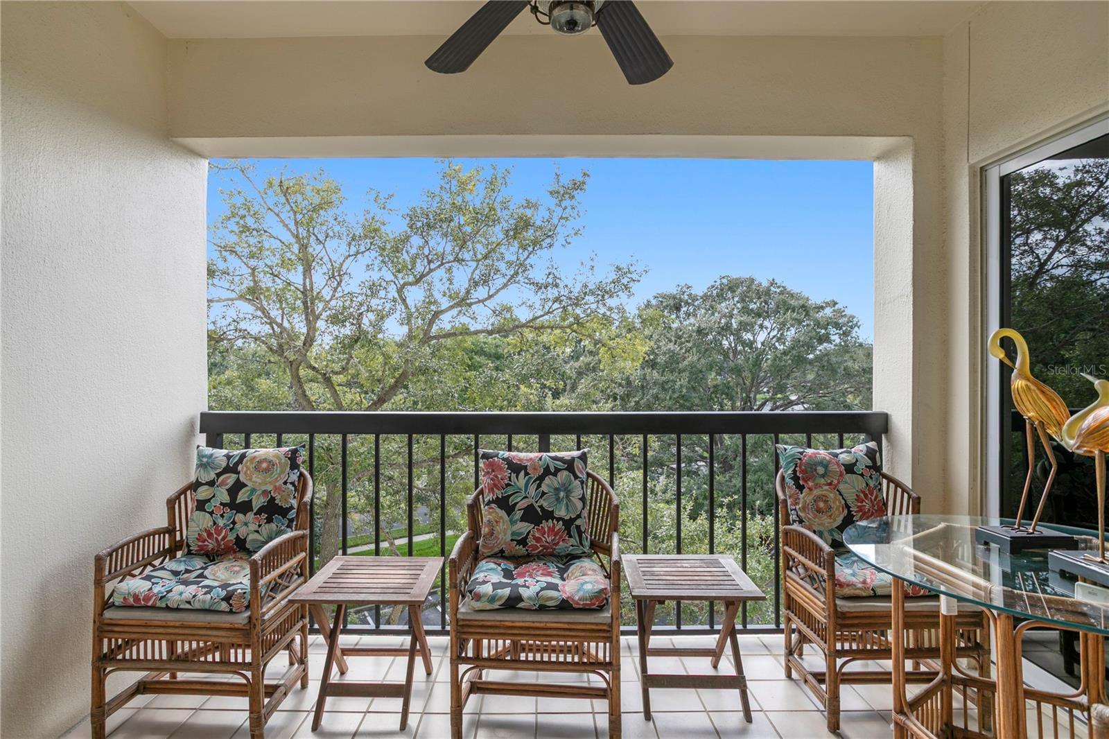 The balcony off the living room offers western-facing views—perfect for enjoying glimpses of the evening sunset.