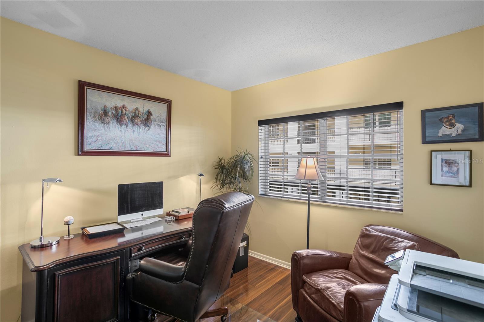 The secondary bedroom offers flexibility—perfect for guests or a comfortable home office