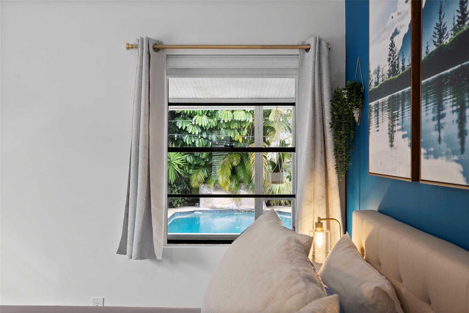 pool views from the primary bedroom