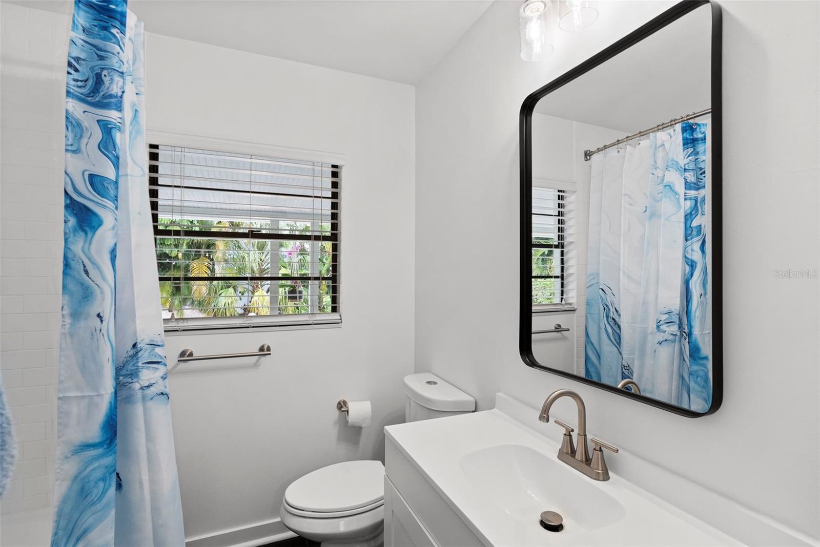 clean and functional secondary bathroom