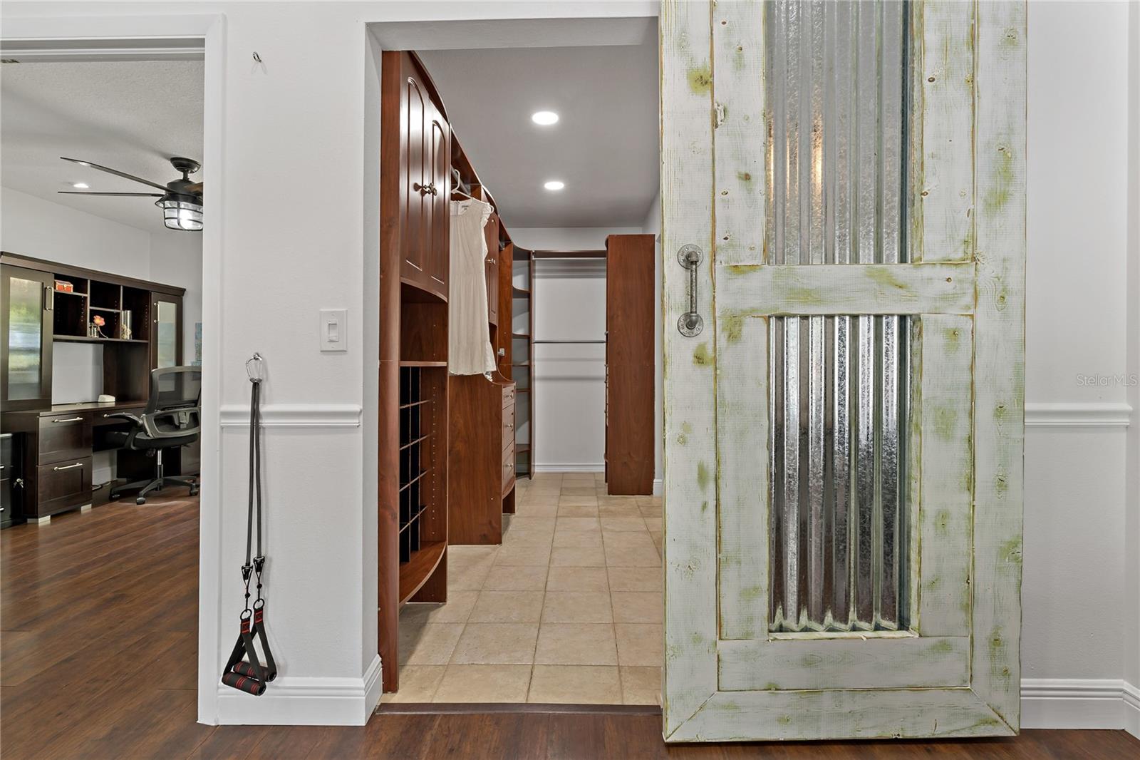 CUSTOM-BUILT BARN DOOR & WALK-IN CLOSET