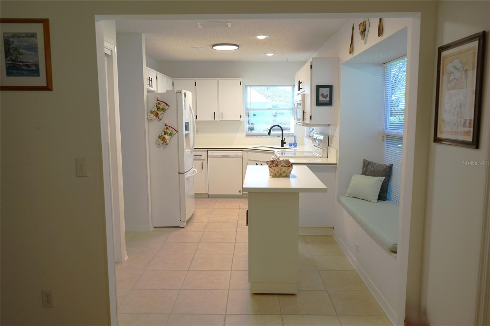 looking into kitchen from bonus area