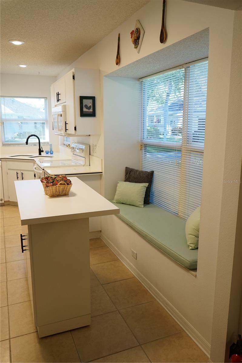 window seat and rolling island