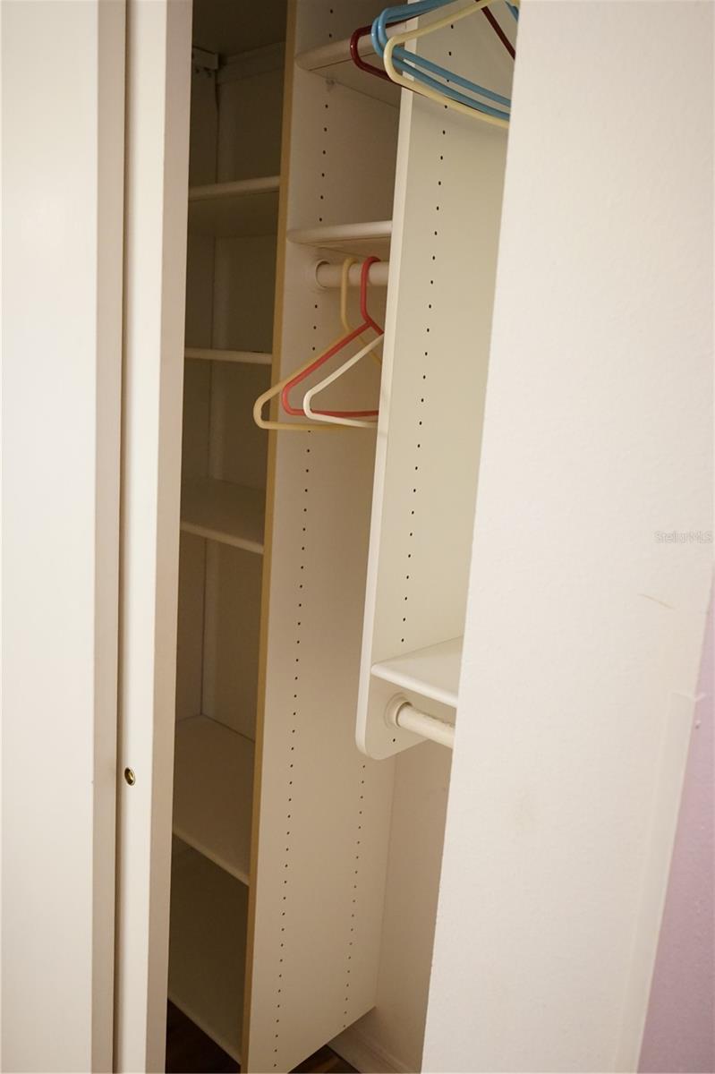 linen closet by guest bedroom