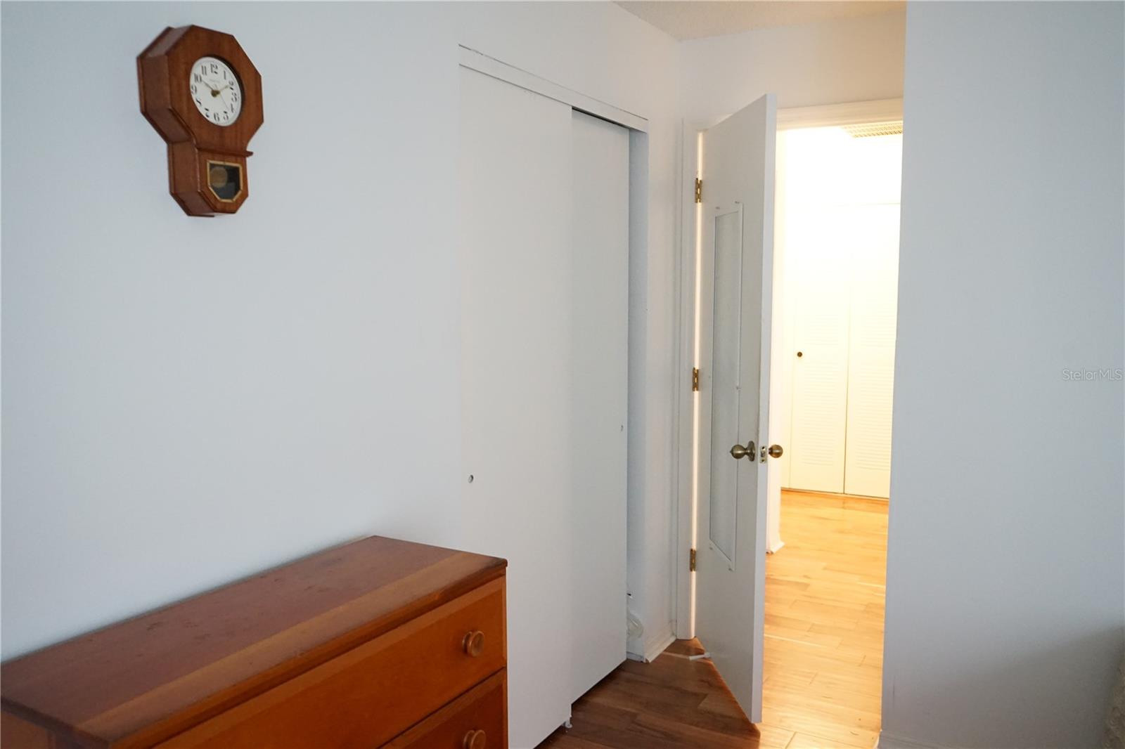 guest bedroom has built in closet