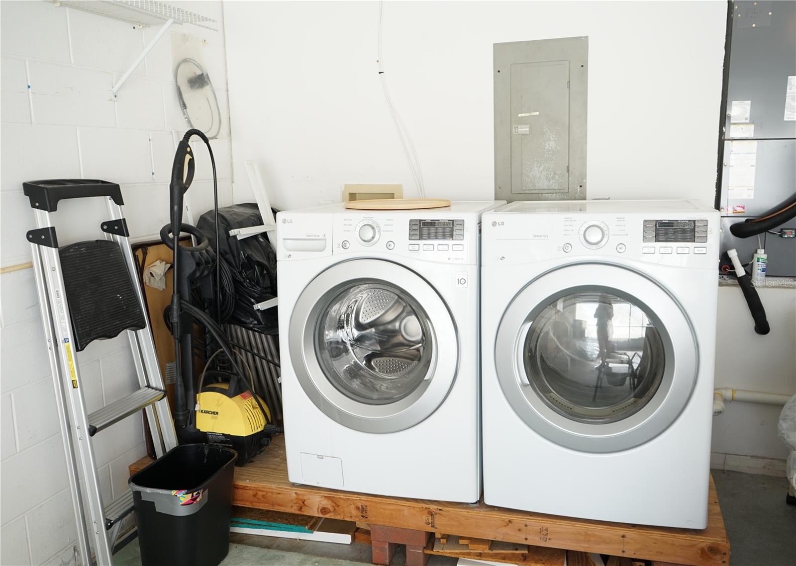 laundry in garage is up on a pedestal