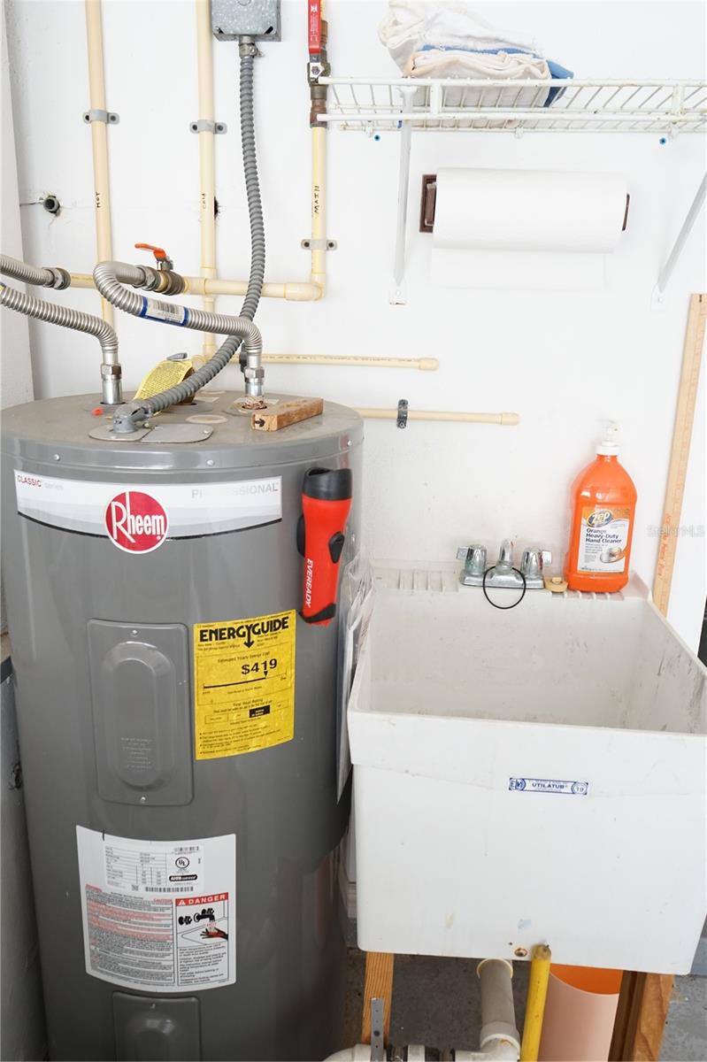 water heater is 2018 and sink in garage