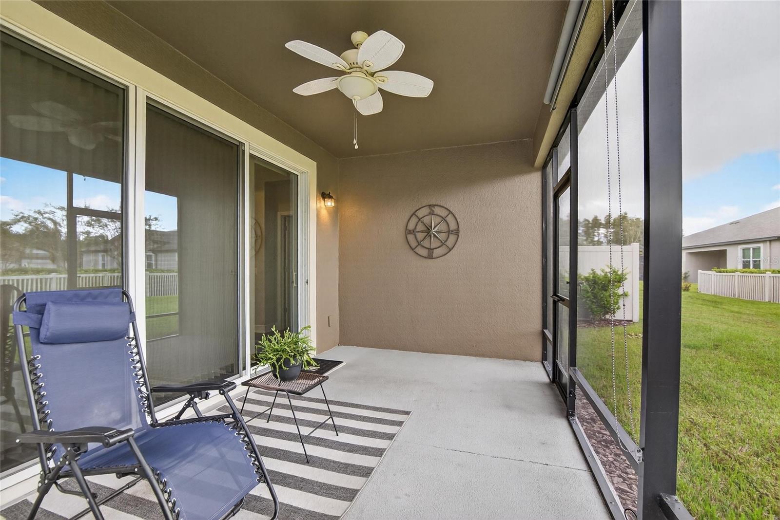screened in porch with solar retractable shades