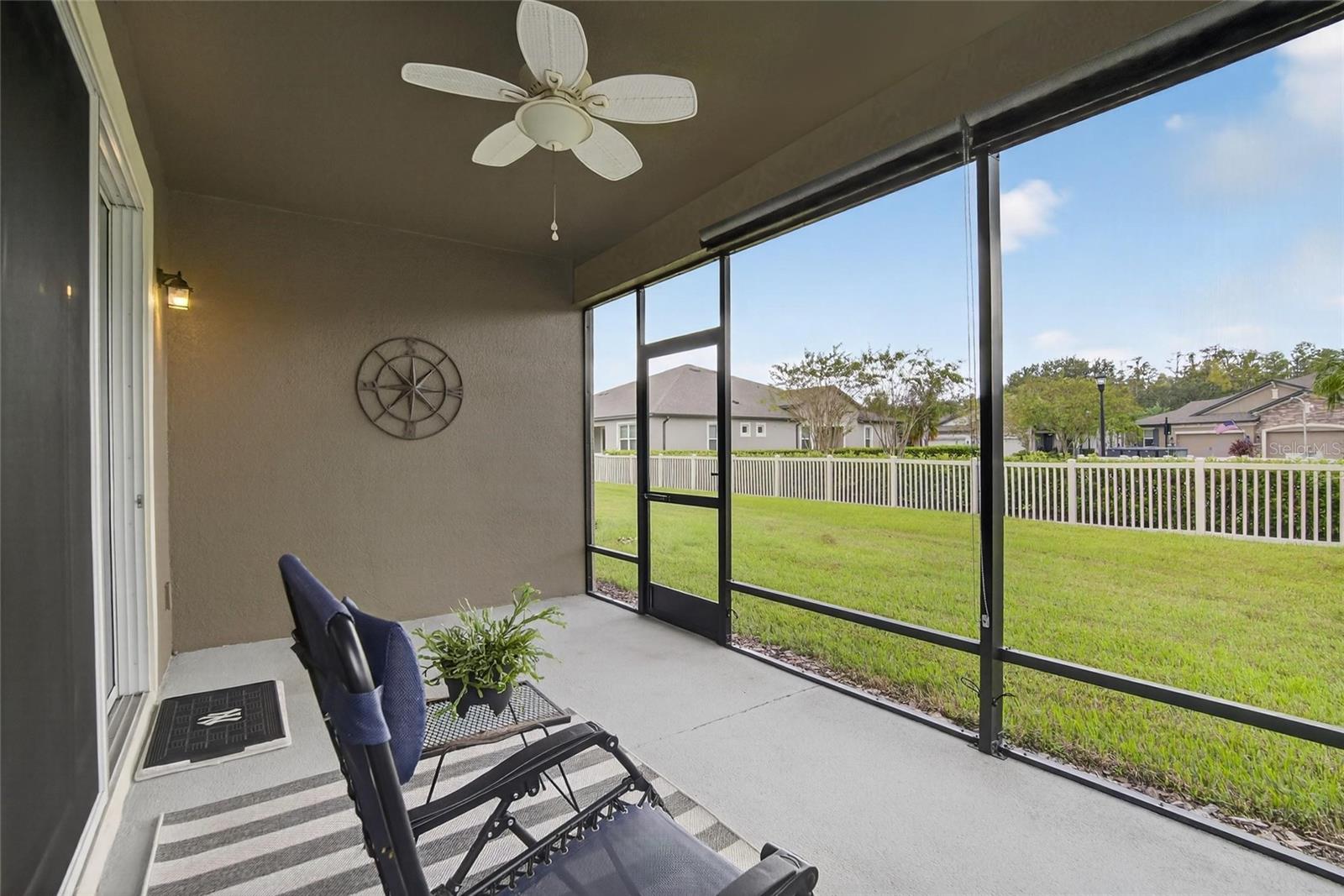 screened in porch with solar retractable shades