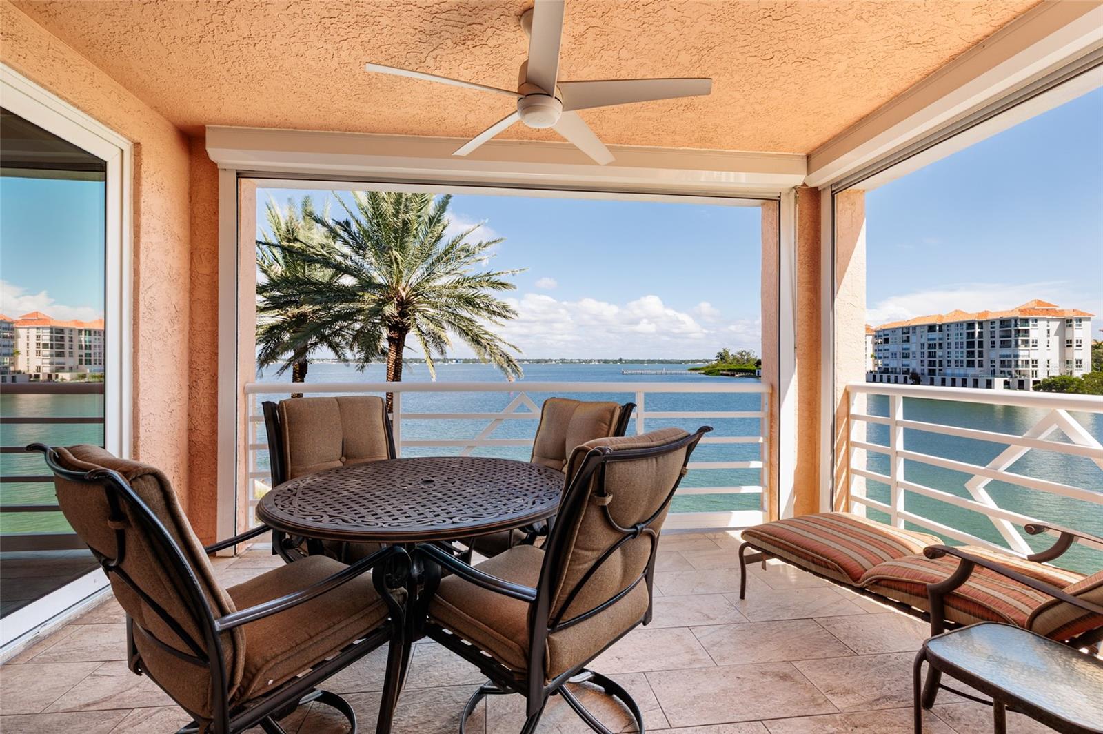 Balcony w/2023 Hurricane Shutters. Balcony deck resurfaced 2024.