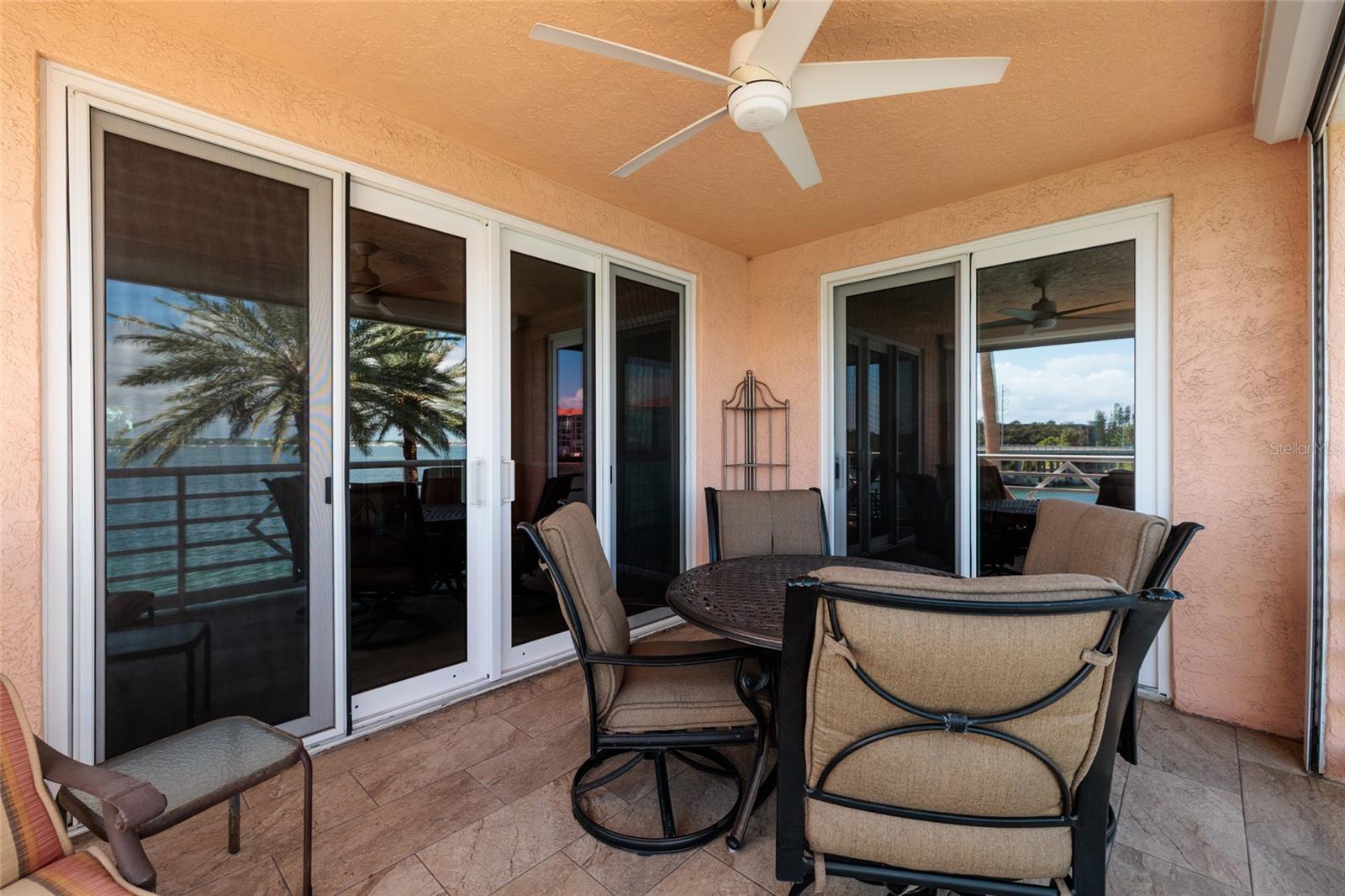 Back balcony w/2023 High Impact sliders. Balcony deck resurfaced 2024.
