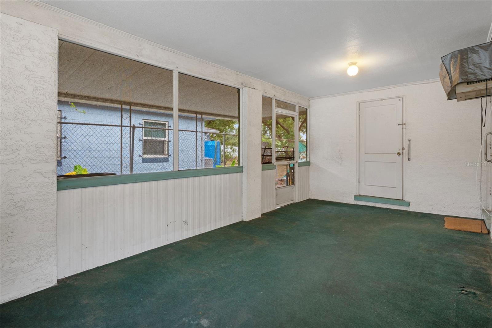 Screen Enclosed Carport