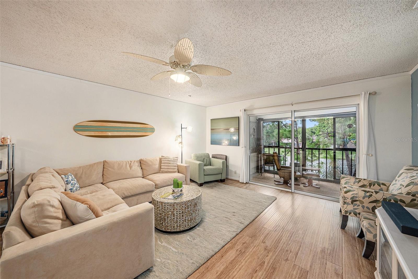 Spacious Living Room with Glass/Screen Balcony