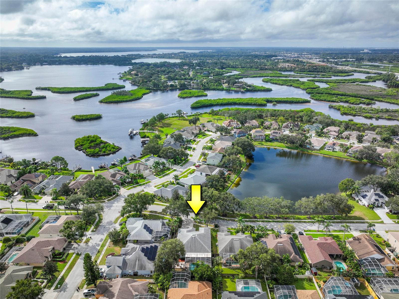 Pond view from front of the home and Boat access in the subdivision