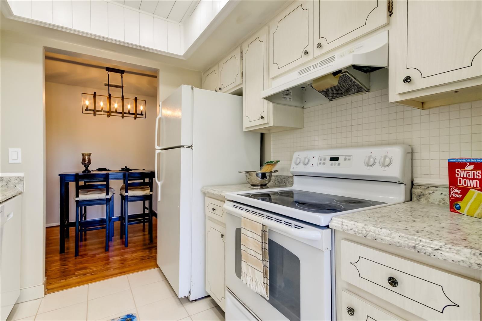 25. Kitchen Flows into Dining Area..