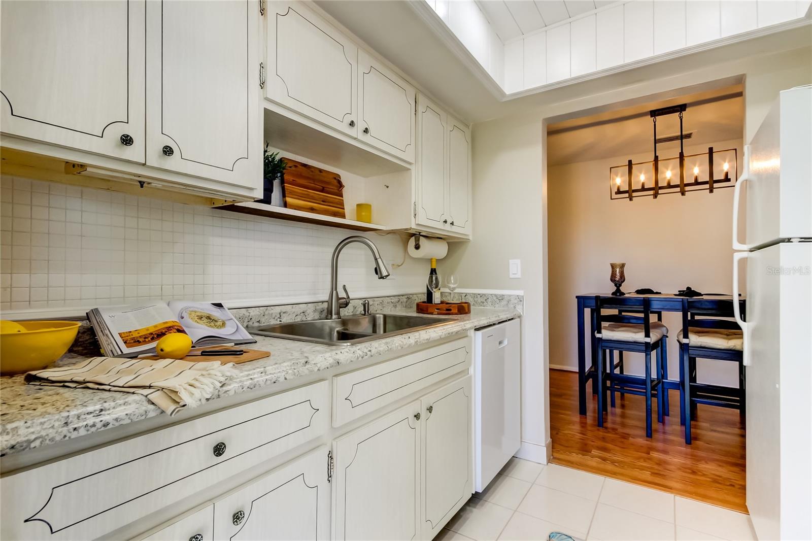 26. Plenty of Uppers & Lowers on Both Sides of this Galley Kitchen Make Storage a Breeze!