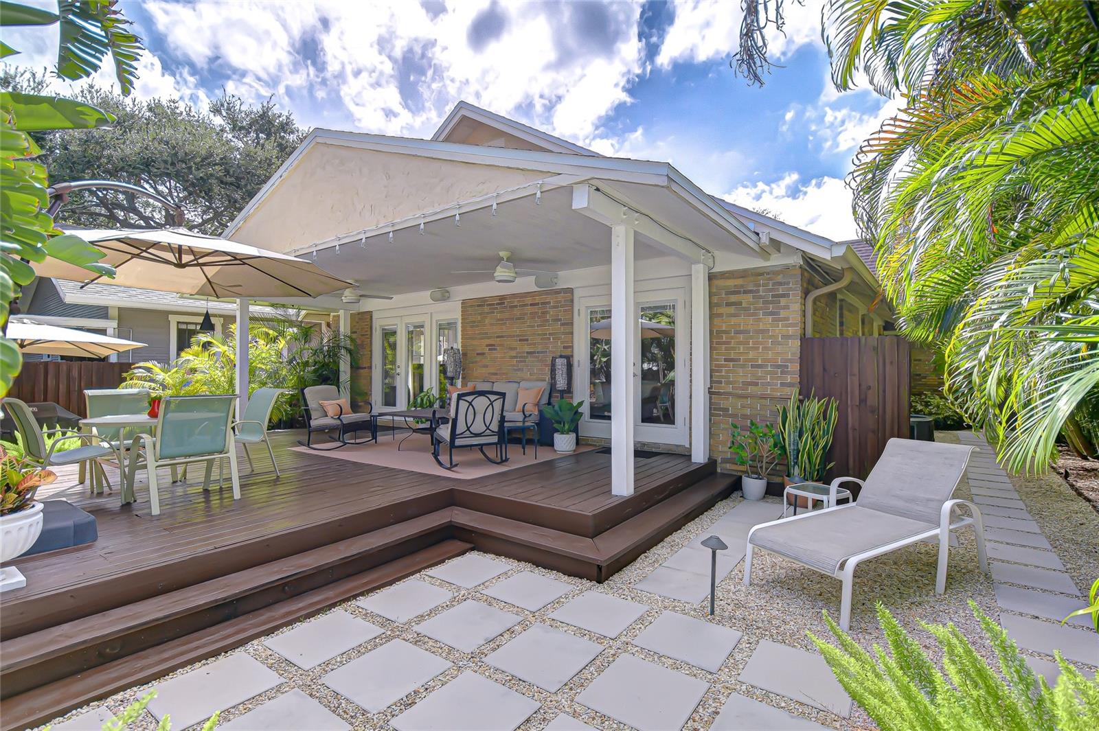Under roof patio, deck and lush landscaping added in 2017