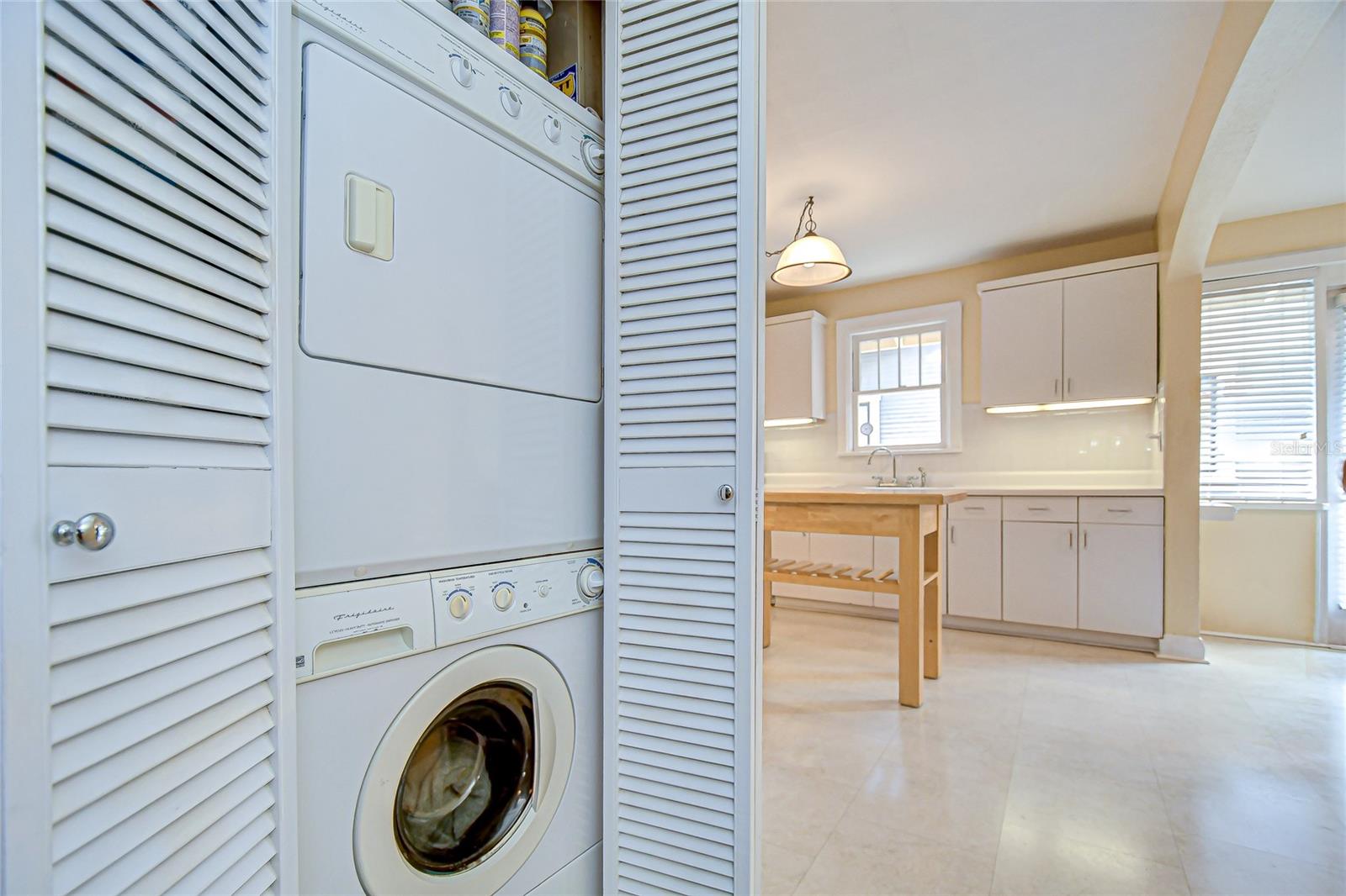 Stackable washer/dryer in utility closet